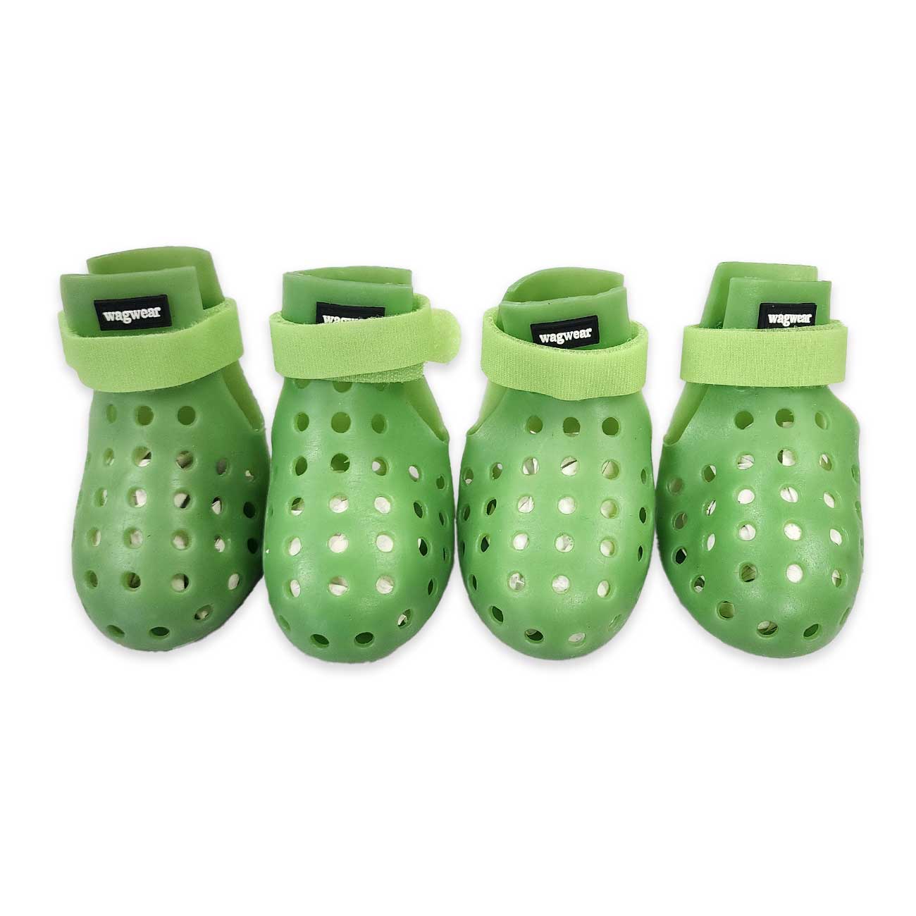Four green pet boots with holes on a white background