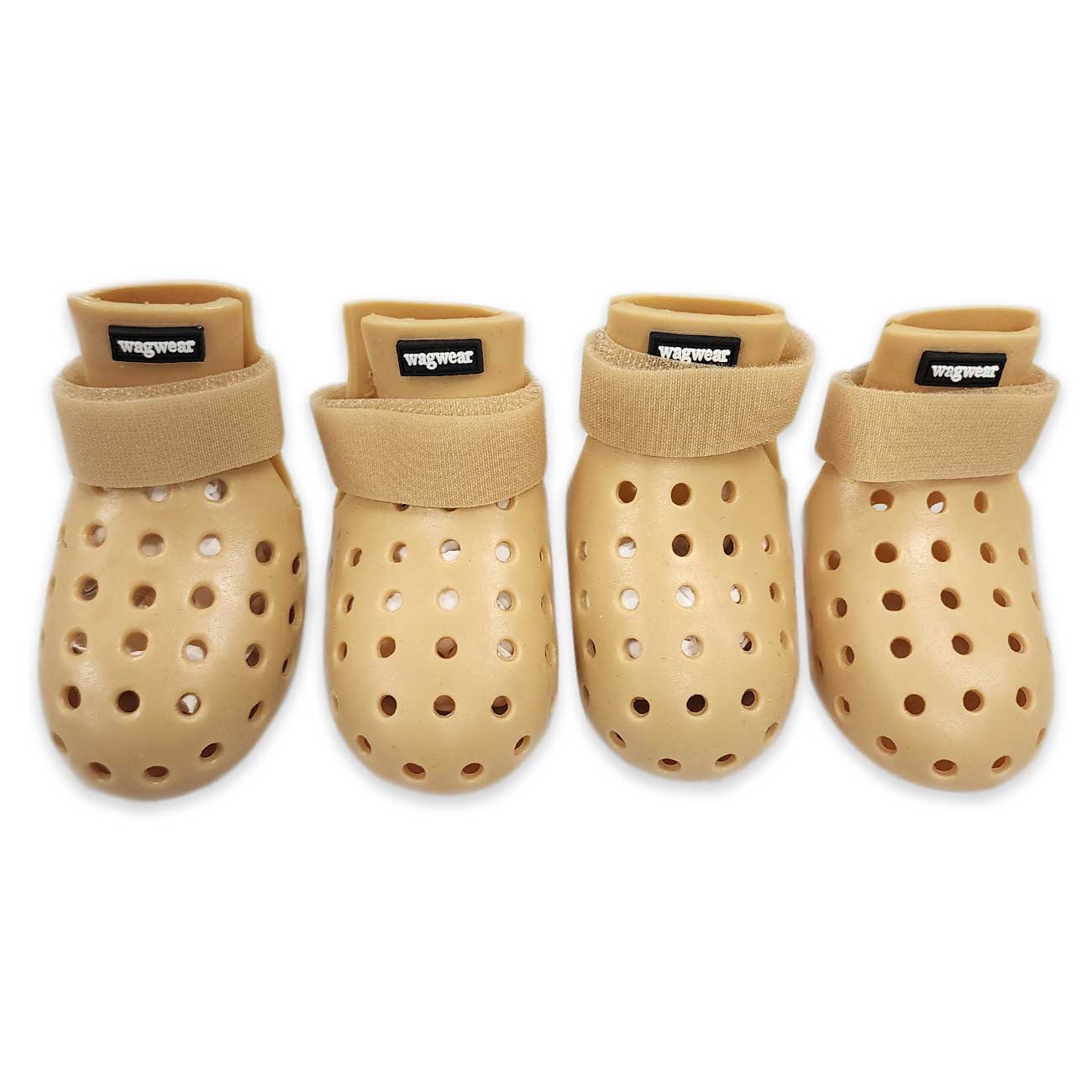 Four beige dog boots with holes on a white background