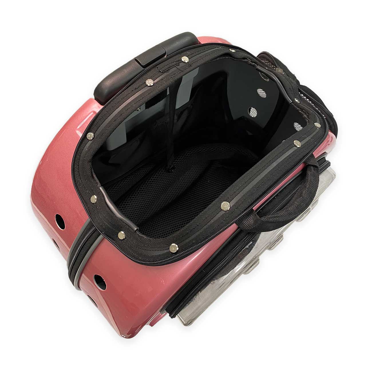 Pink pet trolley case carrier with black interior on a white background
