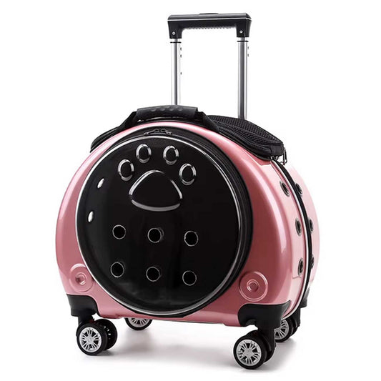 Pink pet trolley case with black circular design on a white background